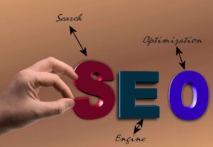 A hand adjusting the letter 'S' in the acronym SEO, with arrows pointing to the words 'Search,' 'Engine,' and 'Optimization' to represent Search Engine Optimization